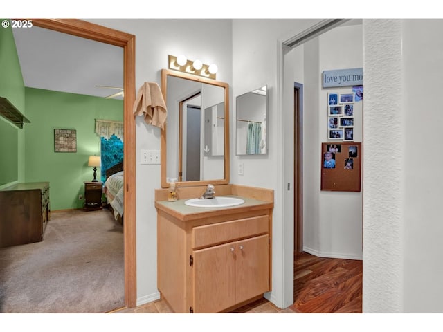 ensuite bathroom featuring vanity and ensuite bath