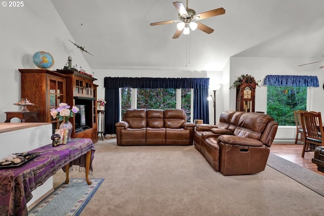 3347 31st St, Florence, OR 97439 - living area with ceiling fan, a wealth of natural light, and high vaulted ceiling