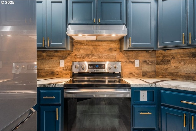 kitchen with blue cabinets, under cabinet range hood, and stainless steel electric range