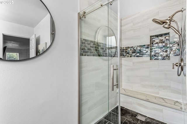 full bath featuring a shower stall