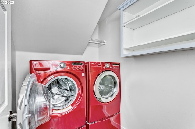 washroom featuring laundry area and independent washer and dryer