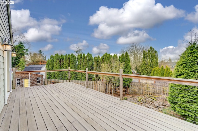 deck with an outbuilding