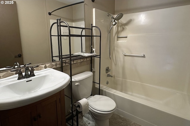 full bathroom featuring toilet, bathtub / shower combination, and vanity