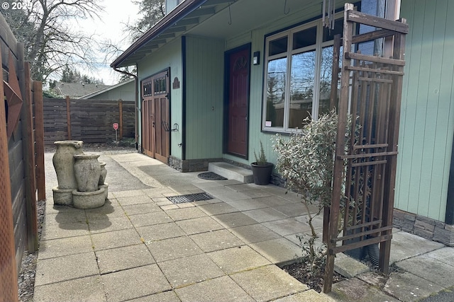 view of patio with a fenced backyard and entry steps