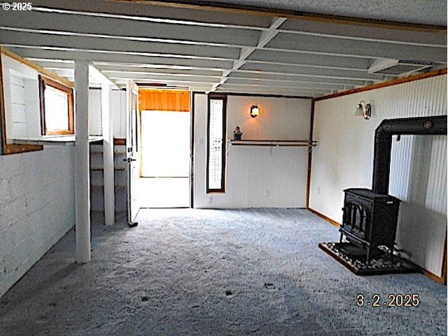 below grade area with a wood stove