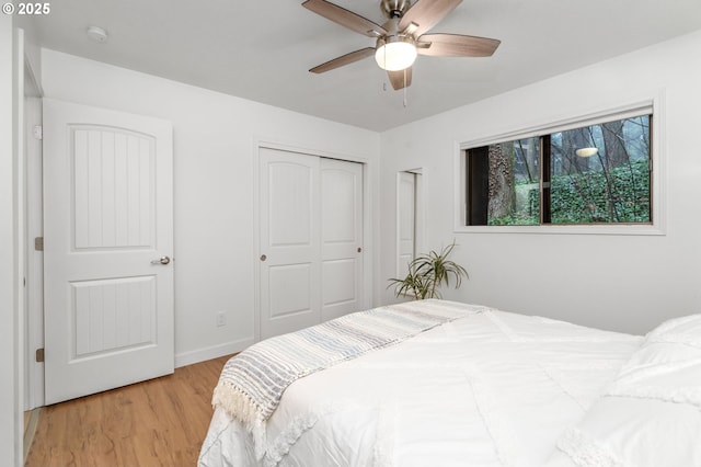 bedroom featuring ceiling fan and light hardwood / wood-style floors