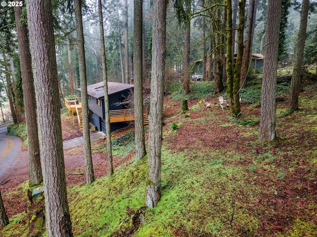 view of yard featuring a wooden deck