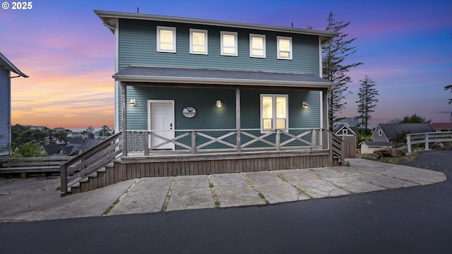 2539 SW Coral Loop, Lincoln City, OR 97367 - view of front of home with a porch