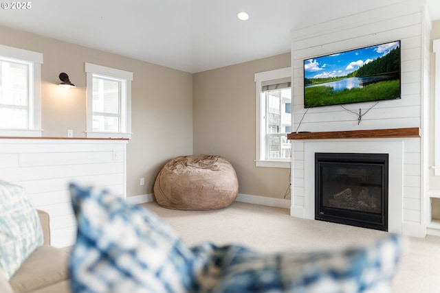 2539 SW Coral Loop, Lincoln City, OR 97367 - living area with carpet flooring, a fireplace, and recessed lighting