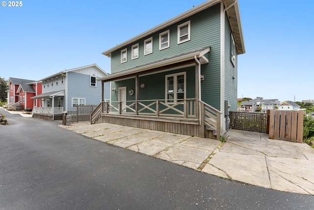 2539 SW Coral Loop, Lincoln City, OR 97367 - view of front of home with a porch