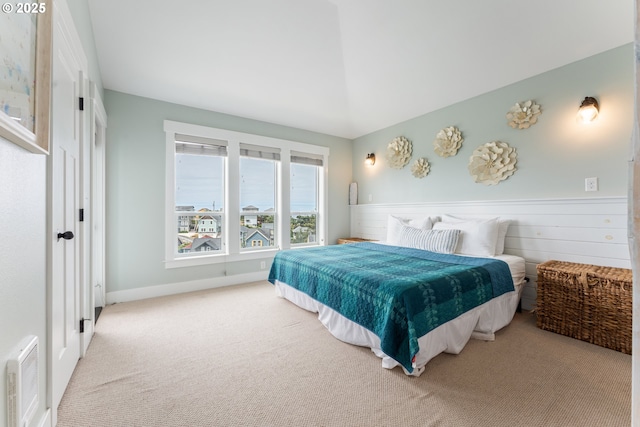 2539 SW Coral Loop, Lincoln City, OR 97367 - carpeted bedroom featuring baseboards and lofted ceiling