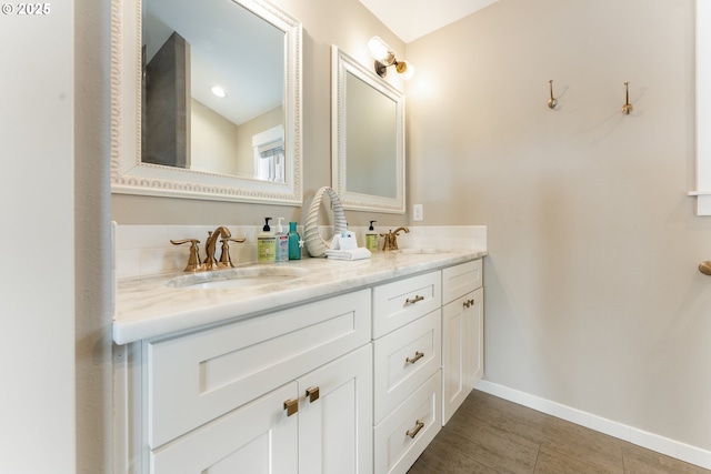 2539 SW Coral Loop, Lincoln City, OR 97367 - full bathroom with double vanity and baseboards