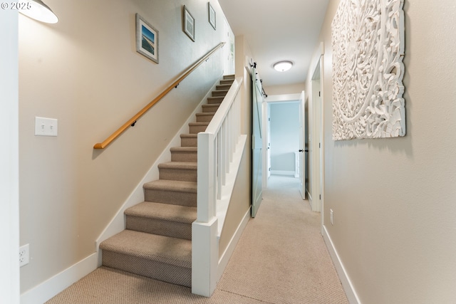 2539 SW Coral Loop, Lincoln City, OR 97367 - stairway with carpet and a barn door
