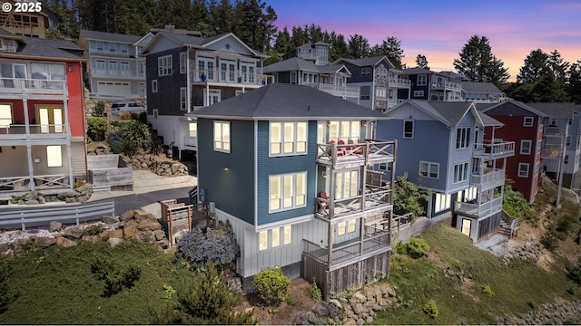 2539 SW Coral Loop, Lincoln City, OR 97367 - rear view of house with a residential view
