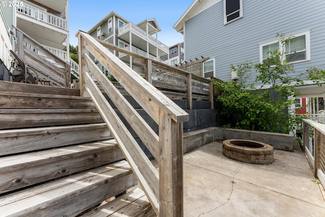 2539 SW Coral Loop, Lincoln City, OR 97367 - exterior space with an outdoor fire pit and stairs