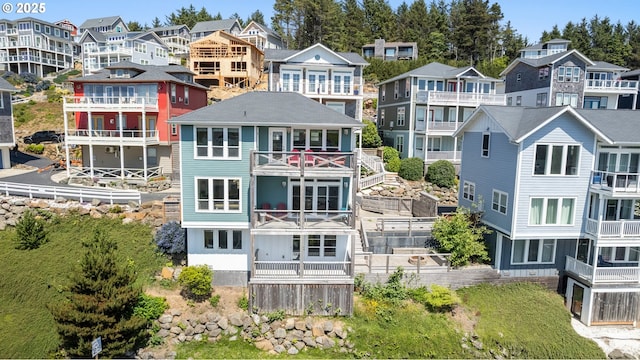 2539 SW Coral Loop, Lincoln City, OR 97367 - rear view of property featuring a residential view