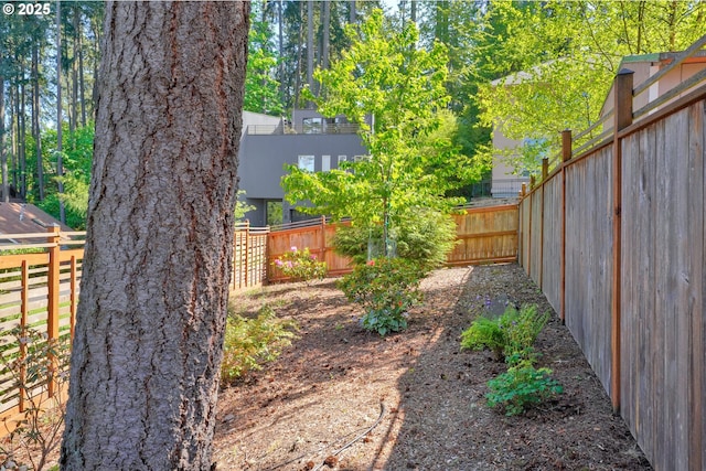 view of yard featuring a fenced backyard