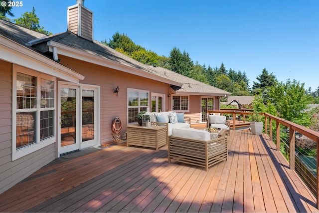 wooden deck featuring an outdoor living space