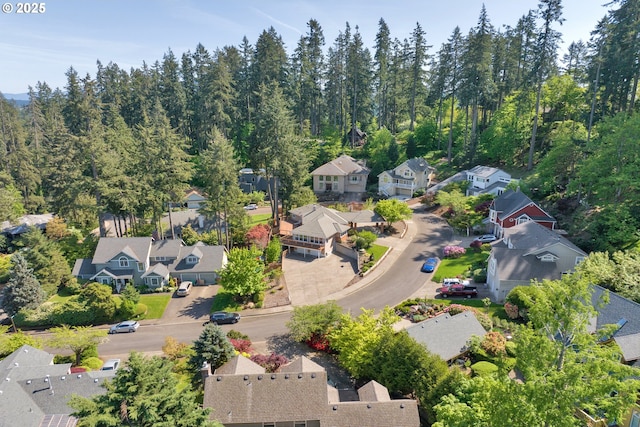 birds eye view of property with a residential view