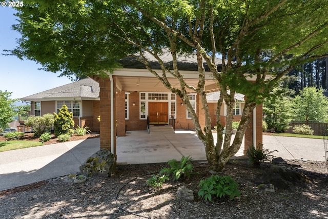 view of front of home with brick siding