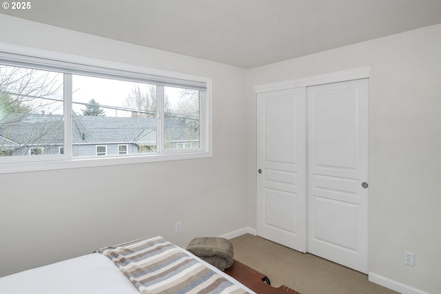 109 NE Shaver Ave, Portland, OR 97212 - bedroom featuring carpet flooring, baseboards, and a closet