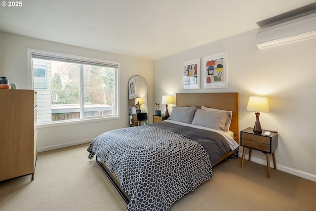 109 NE Shaver Ave, Portland, OR 97212 - bedroom featuring a wall mounted AC, carpet, and baseboards