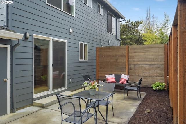 109 NE Shaver Ave, Portland, OR 97212 - fenced backyard featuring a patio area and an outdoor living space