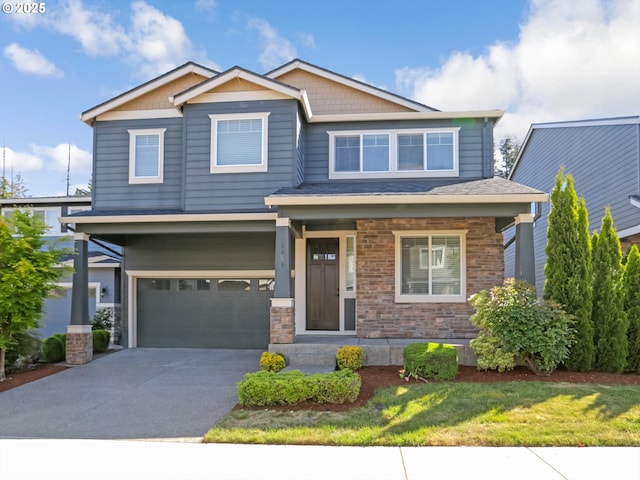 17067 NW Catalpa St, Portland, OR 97229 - craftsman inspired home featuring a garage, driveway, and stone siding