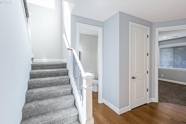 17067 NW Catalpa St, Portland, OR 97229 - stairs with wood finished floors and baseboards
