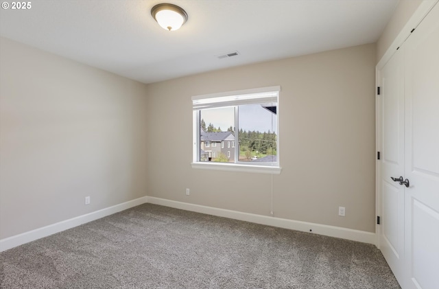 17067 NW Catalpa St, Portland, OR 97229 - carpeted spare room featuring baseboards