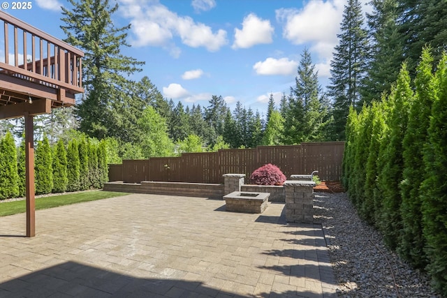 17067 NW Catalpa St, Portland, OR 97229 - view of patio / terrace with an outdoor fire pit