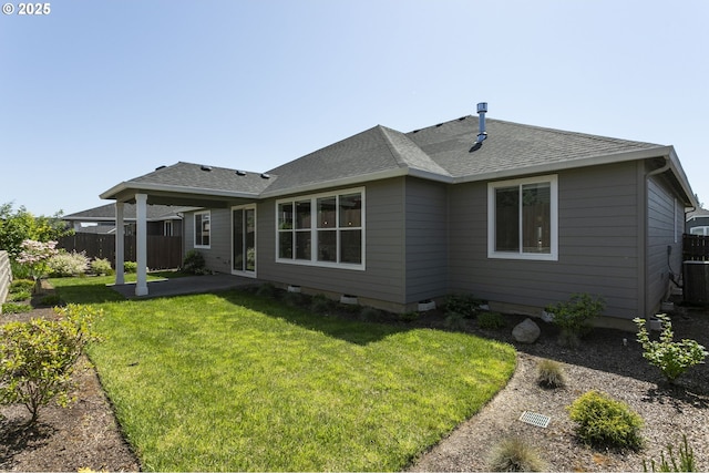2930 S Cherry Grove Way, Ridgefield, WA 98642 - rear view of property with fence, a shingled roof, a lawn, and a patio area