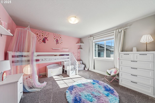 carpeted bedroom with baseboards