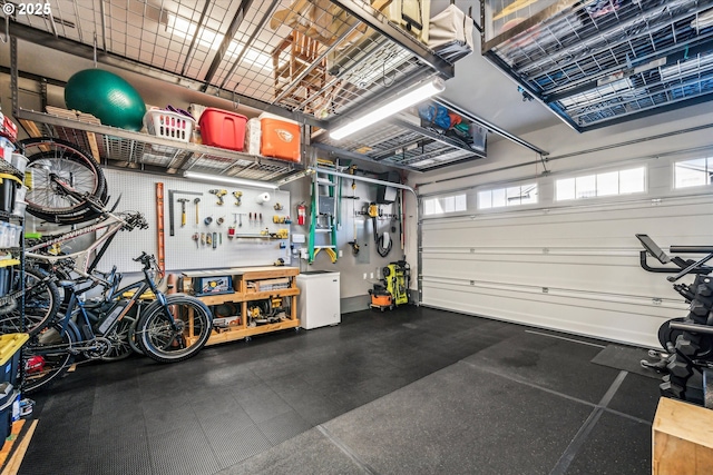 garage with a workshop area