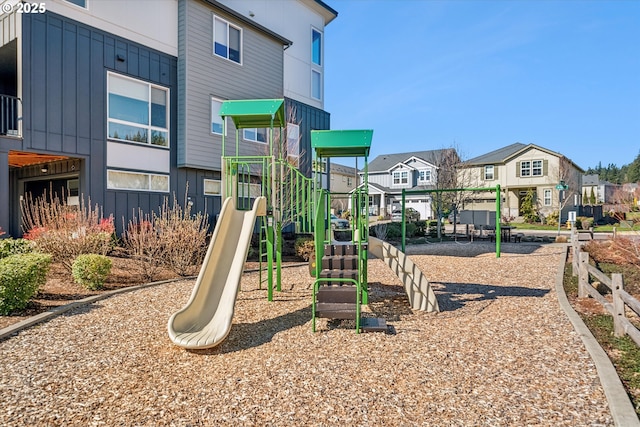 community jungle gym featuring a residential view