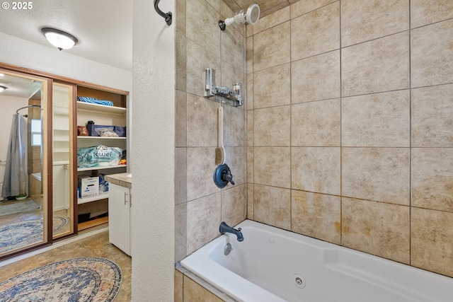 full bath with a combined bath / shower with jetted tub
