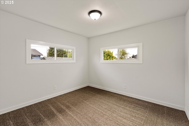 320 Beech St, Longview, WA 98632 - unfurnished room with dark carpet and baseboards