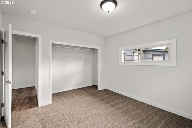 320 Beech St, Longview, WA 98632 - unfurnished bedroom with carpet, baseboards, and a closet