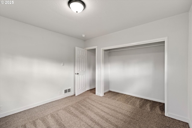 320 Beech St, Longview, WA 98632 - unfurnished bedroom with carpet floors, baseboards, and a closet