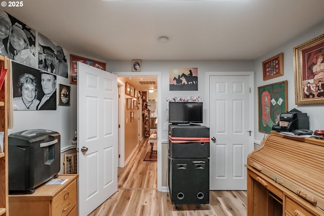 office area featuring light hardwood / wood-style floors