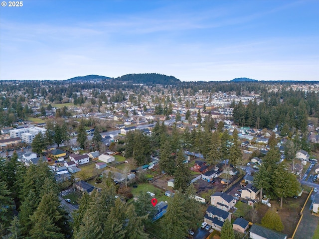 drone / aerial view featuring a mountain view