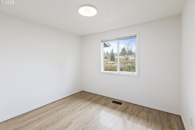 6253 SW 204th Pl, Beaverton, OR 97078 - unfurnished bedroom with light wood-style flooring and a closet