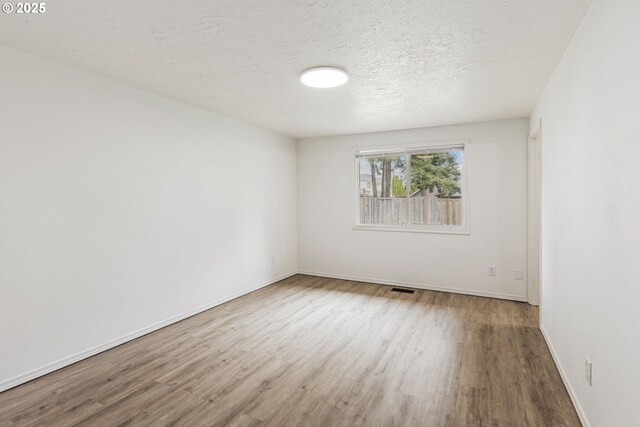 6253 SW 204th Pl, Beaverton, OR 97078 - unfurnished bedroom featuring light wood-style floors, a closet, and ensuite bathroom