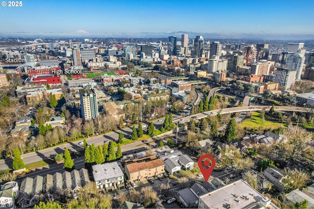 birds eye view of property with a city view