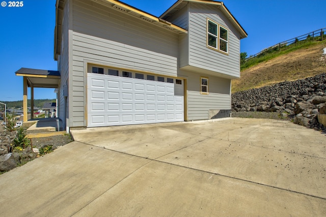 1030 Forest Heights St, Sutherlin, OR 97479 - view of property exterior featuring concrete driveway and a garage
