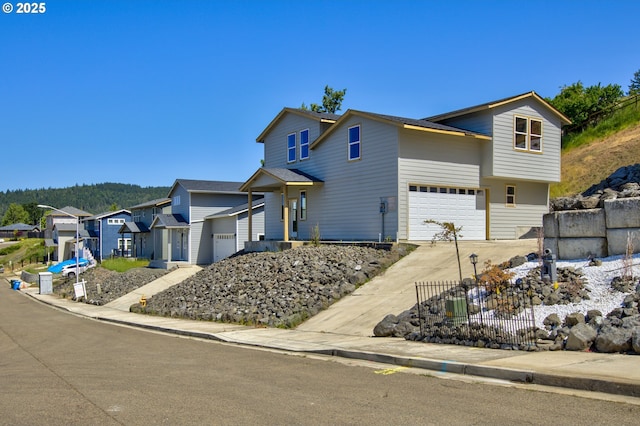 1030 Forest Heights St, Sutherlin, OR 97479 - view of front facade with an attached garage, concrete driveway, and a residential view