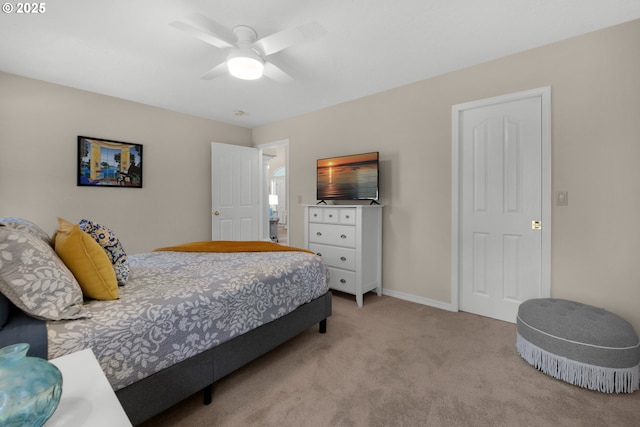 bedroom with ceiling fan and light carpet