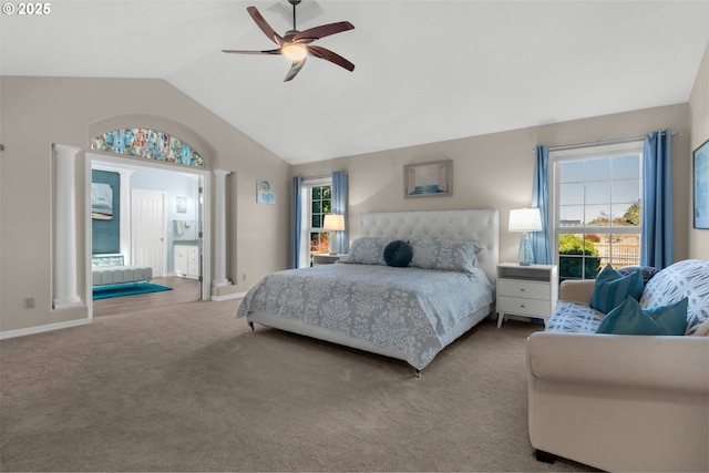 carpeted bedroom with vaulted ceiling and ceiling fan