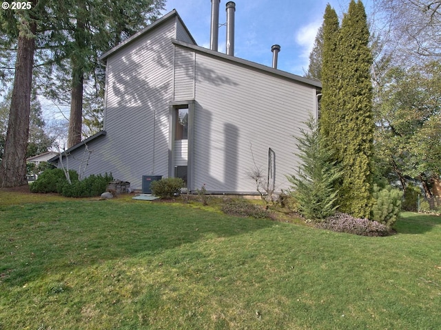 view of home's exterior featuring a yard