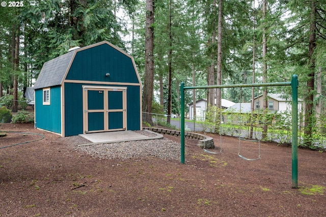 view of shed with fence